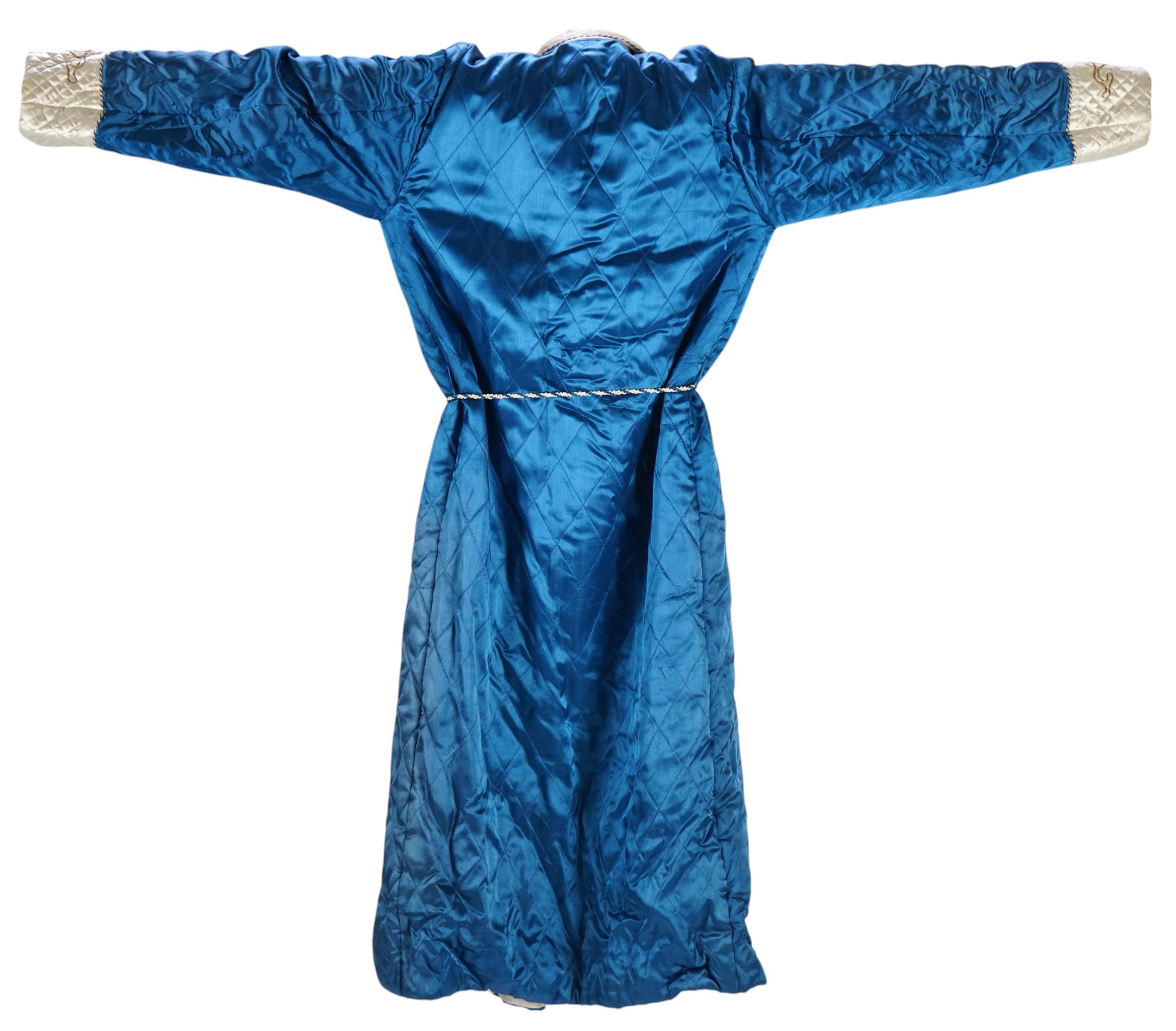 A mid 20th century Royal blue satin gentleman’s smoking jacket and matching dressing gown with Chinese gold dragon embroidery to both the quilted collars and cuffs, measurement from top back of collar to bottom of dressi